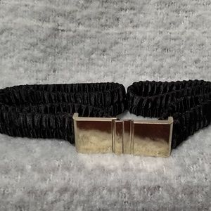 Stretchy black waist cinching belt w/silver buckle